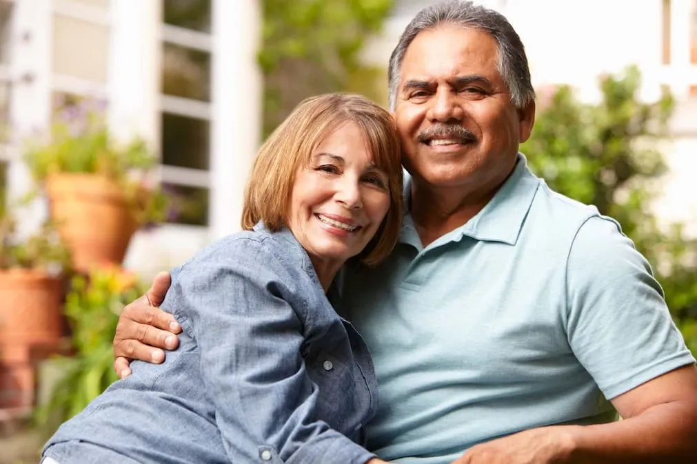 Man holding woman